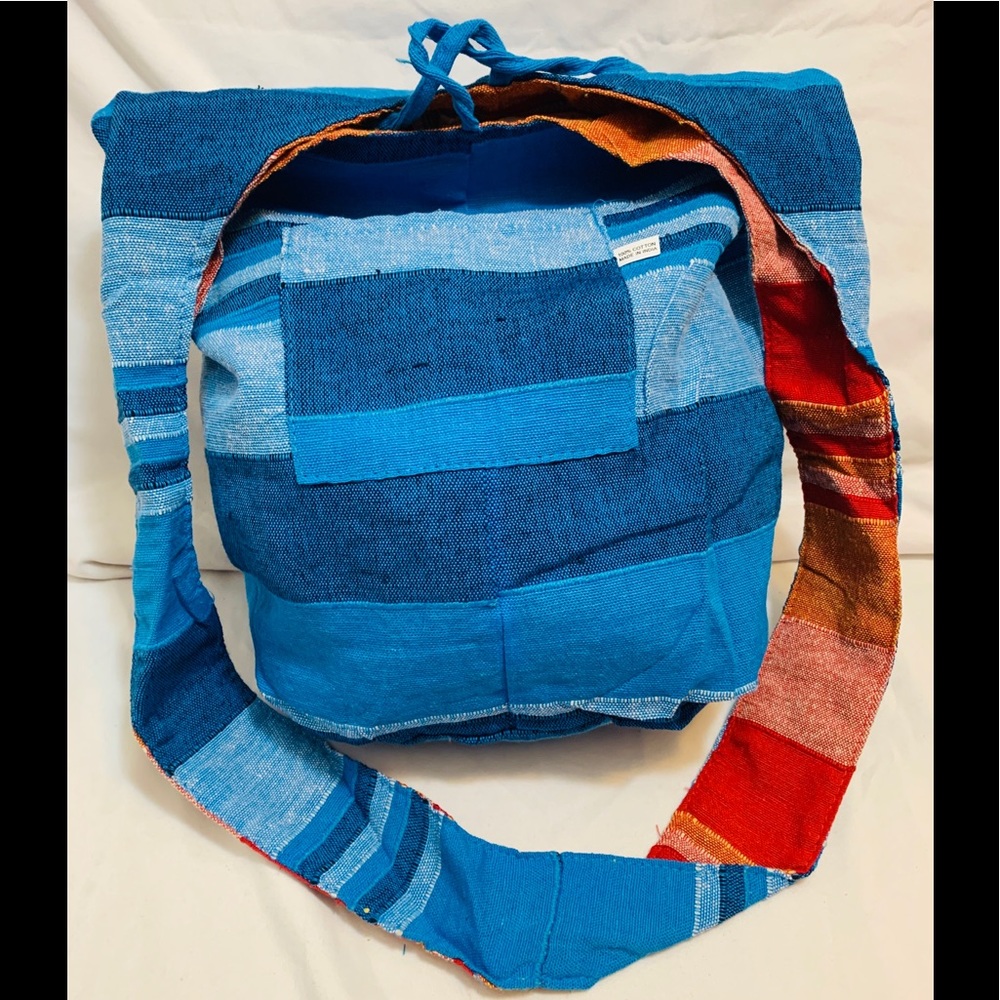 Double sided reversible cross body bag